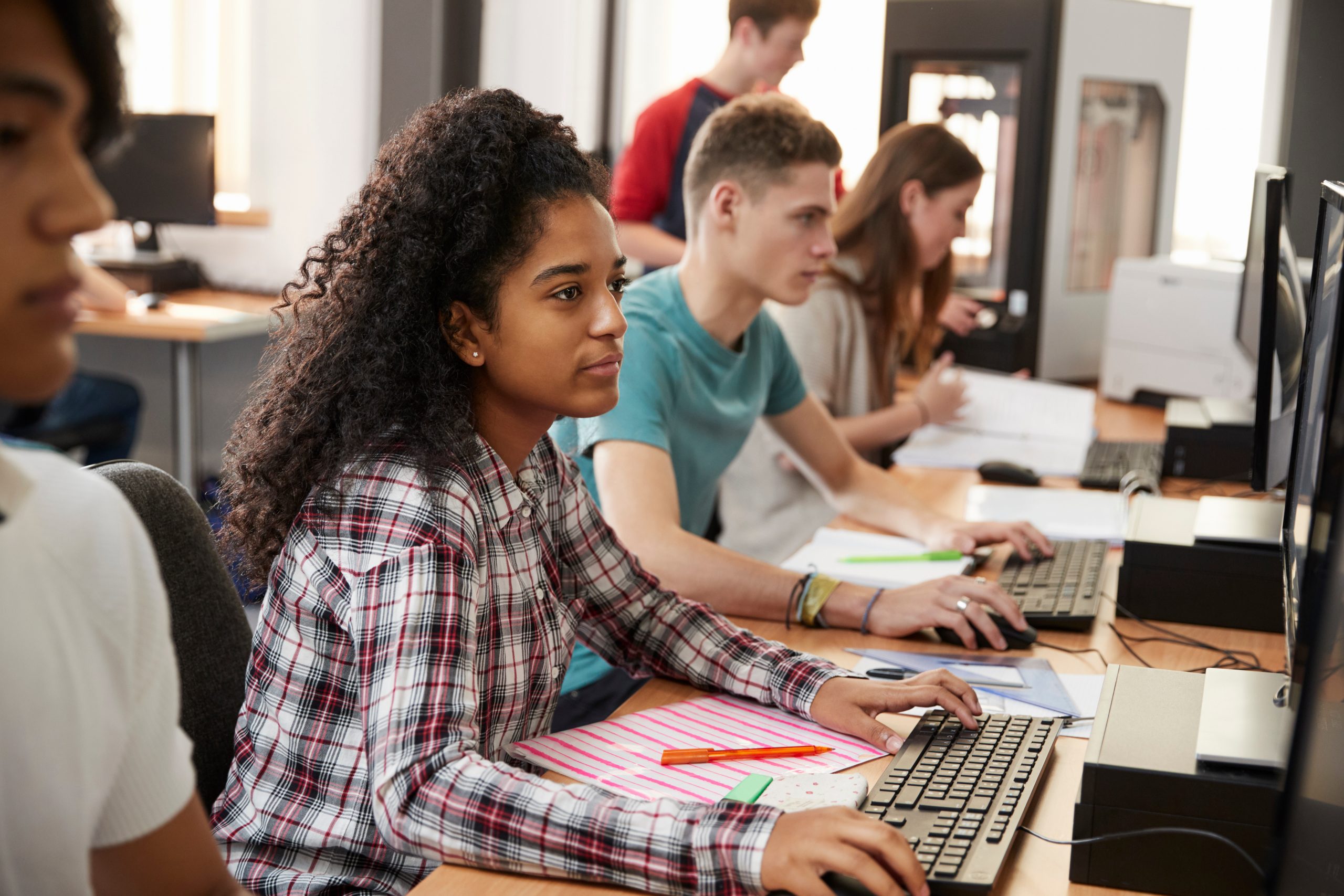 Students work at computers