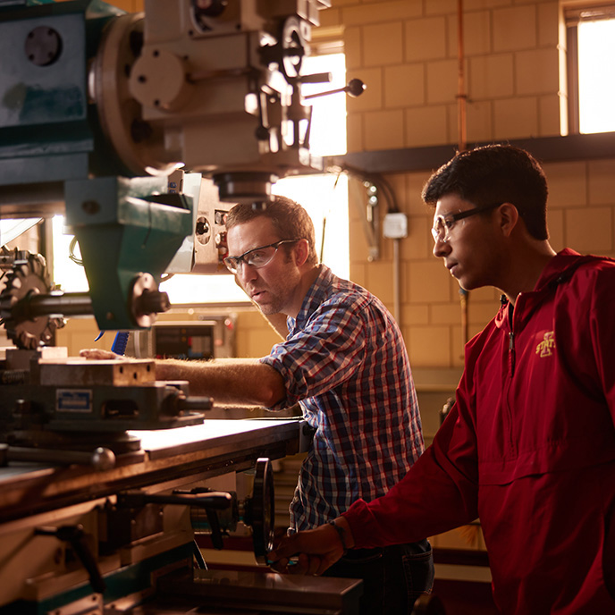 Two students working in a lab